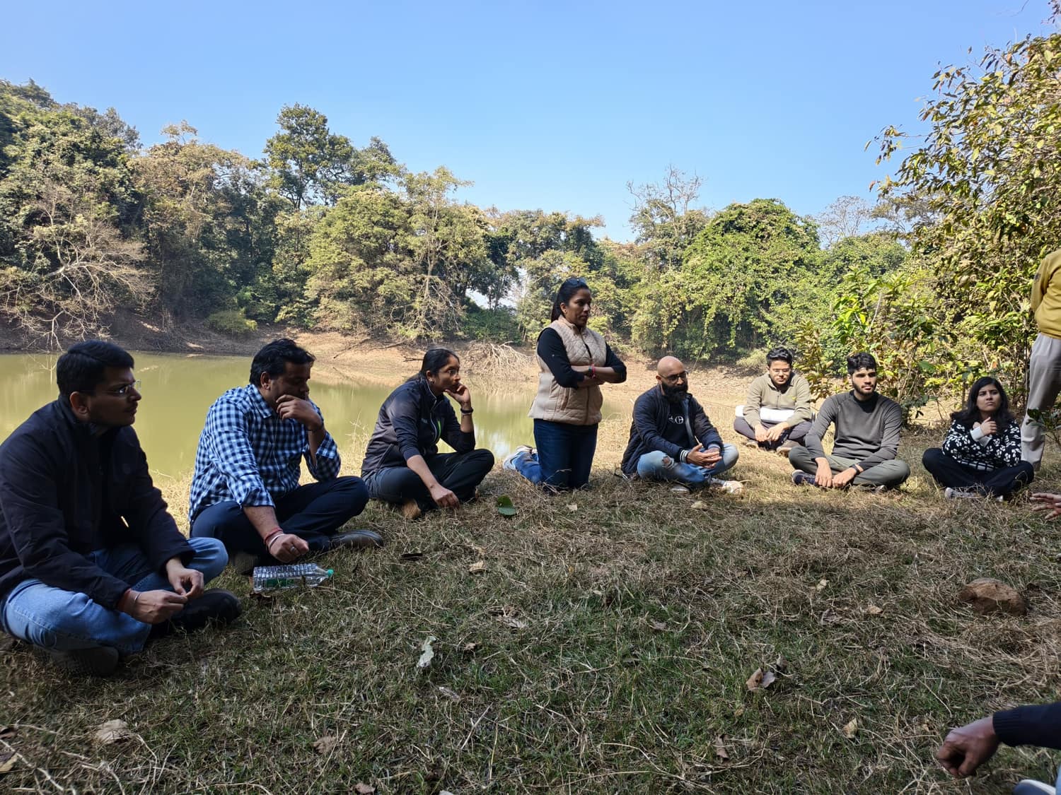 Discussion by the water during the field visit